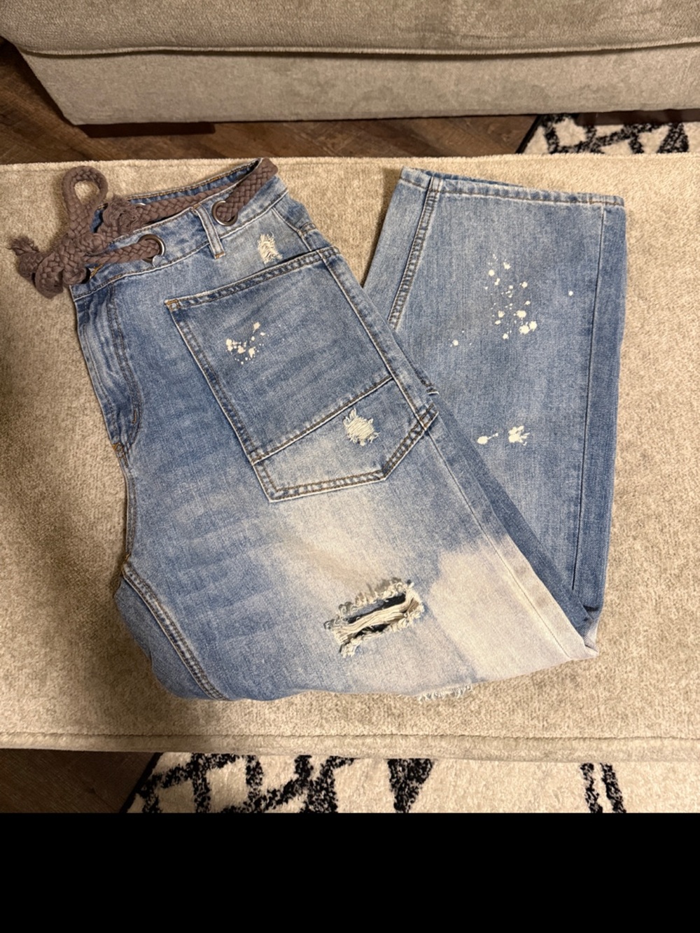 Bleach Splattered Distressed Jeans with Braided Belt